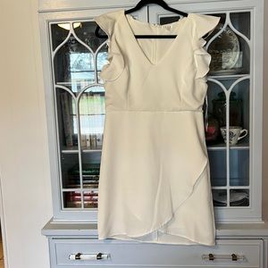 White dress with ruffled sleeves